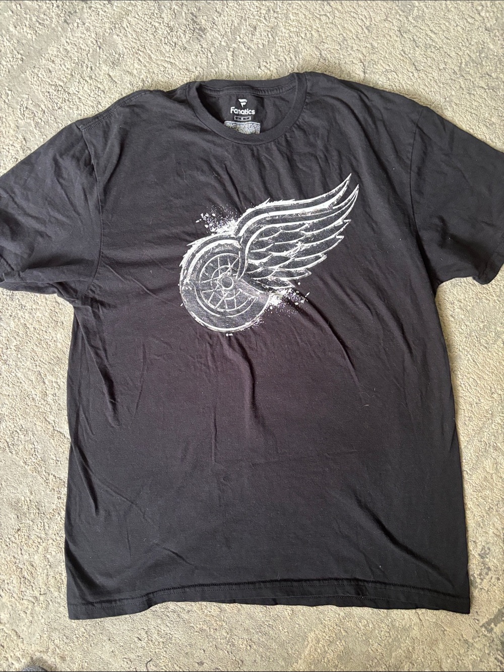 Fanatics Black Short-Sleeve T-Shirt with Distressed White Winged Wheel Graphic